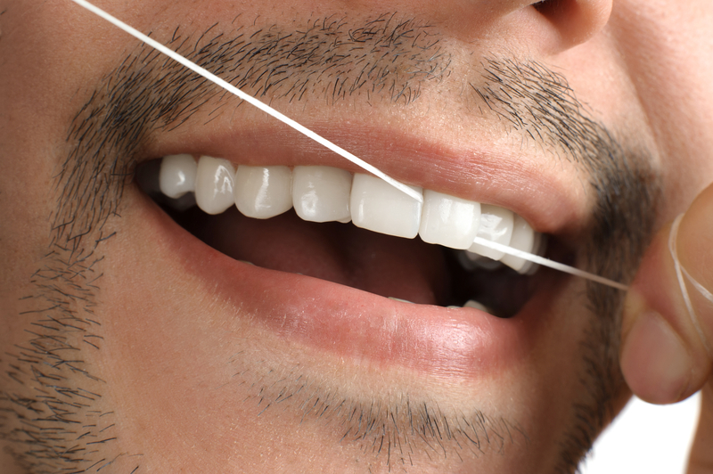 Teeth. Dental floss.