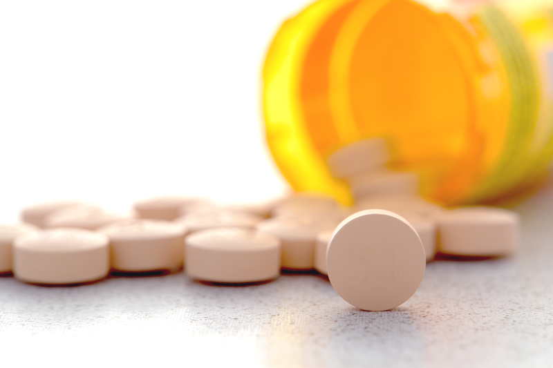 Prescription Medication Pain Pills and Drug Bottle