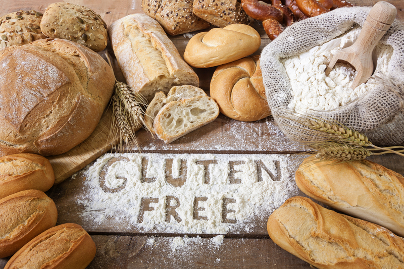 Gluten free breads on wood background