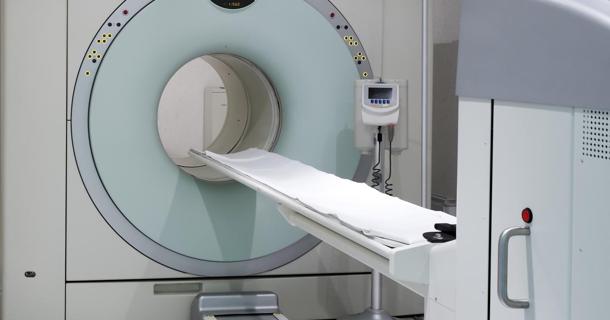 Close up turmeric powder on grunge wooden background.