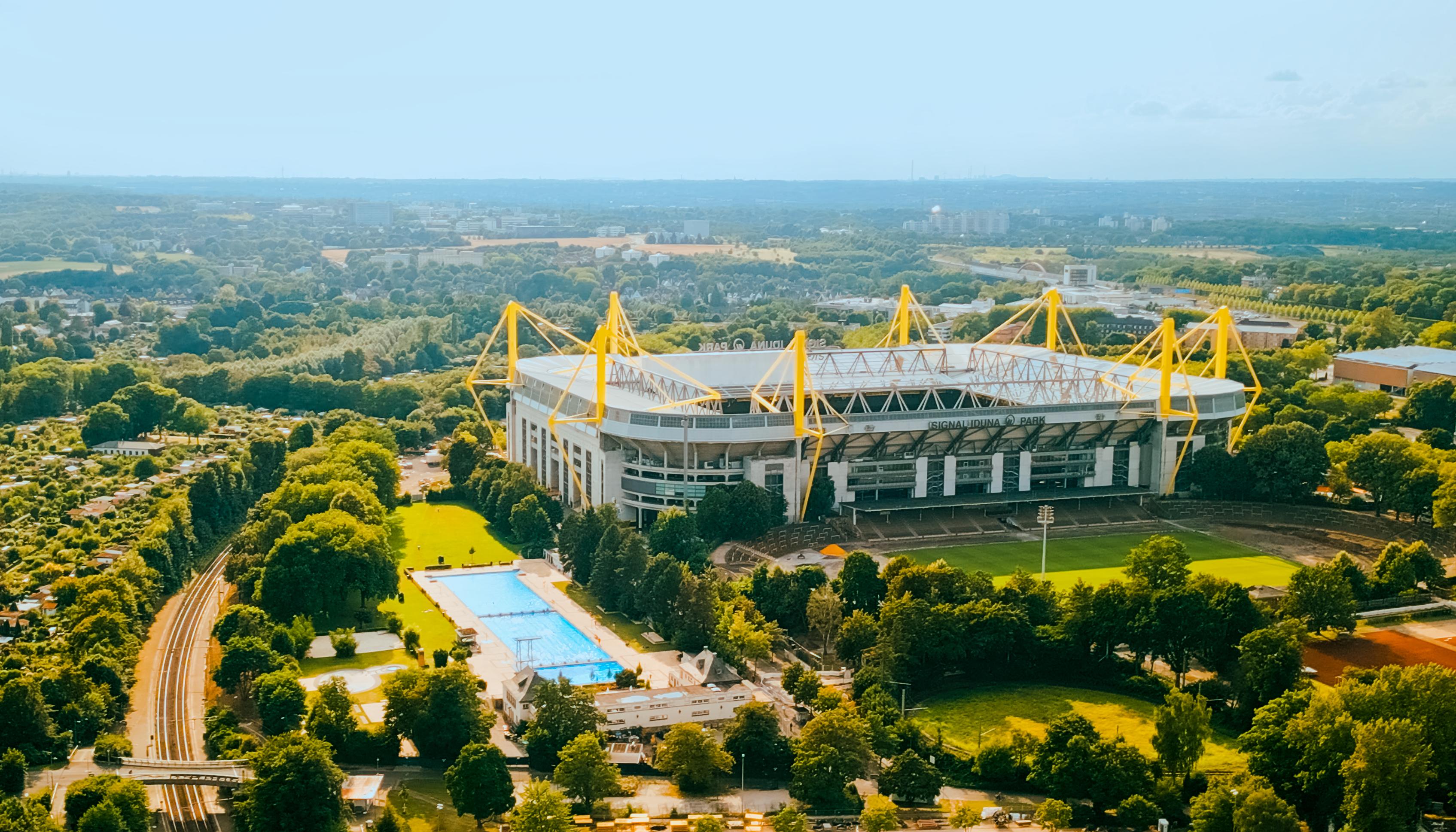 24 Stunning Stadiums That Feel More Like Cathedrals of Sport